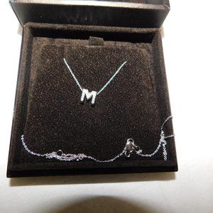 Authentic Roberto Coin 18K white gold and diamond pendants Love Letter M